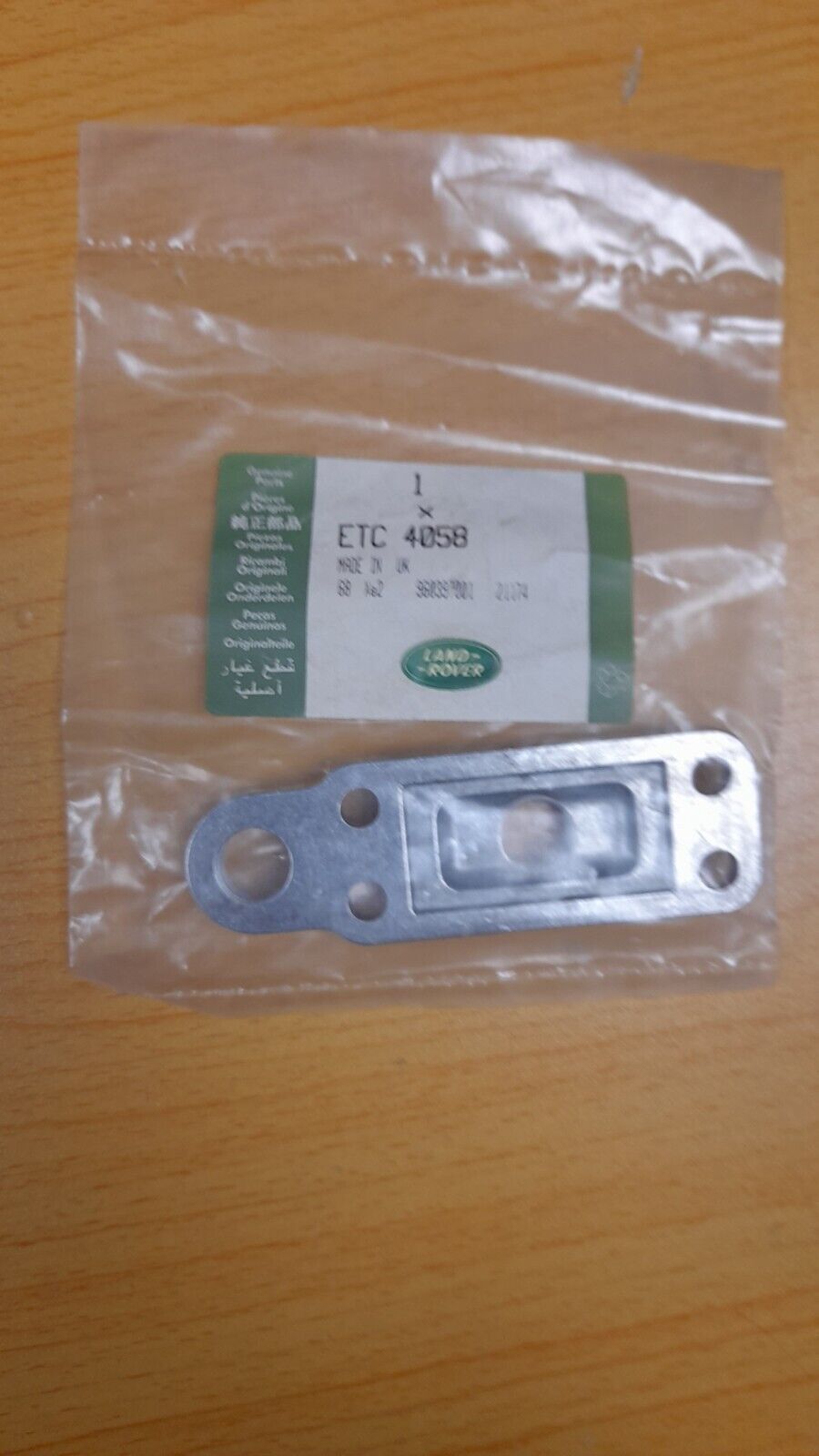 GENUINE LAND ROVER DRAIN PLATE TIMING COVER P/N ETC4058