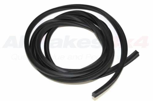 DBF500040 - STRIP - FILLER - GLASS - WITH FIXED REAR WINDOW - Suitable for Defender 2007 Onwards From ALLMAKES
