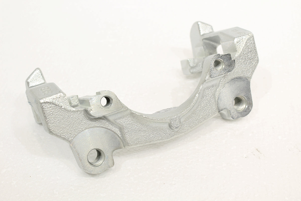 LR000567 - CARRIER-BRAKE CALIPER-FRONT 2.2EFI 2.2D L359 From ATE
