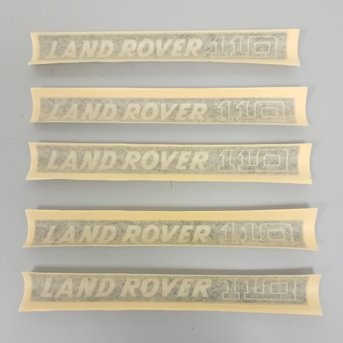 5 x NOS LAND ROVER DEFENDER 110 FRONT PANEL BONNET BADGE VINYL DECAL MUC2003