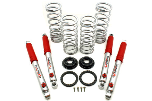 TF259 - 2" lift medium load air to coil conv kit with +3" 4 Stg Adj shocks Discovery 2